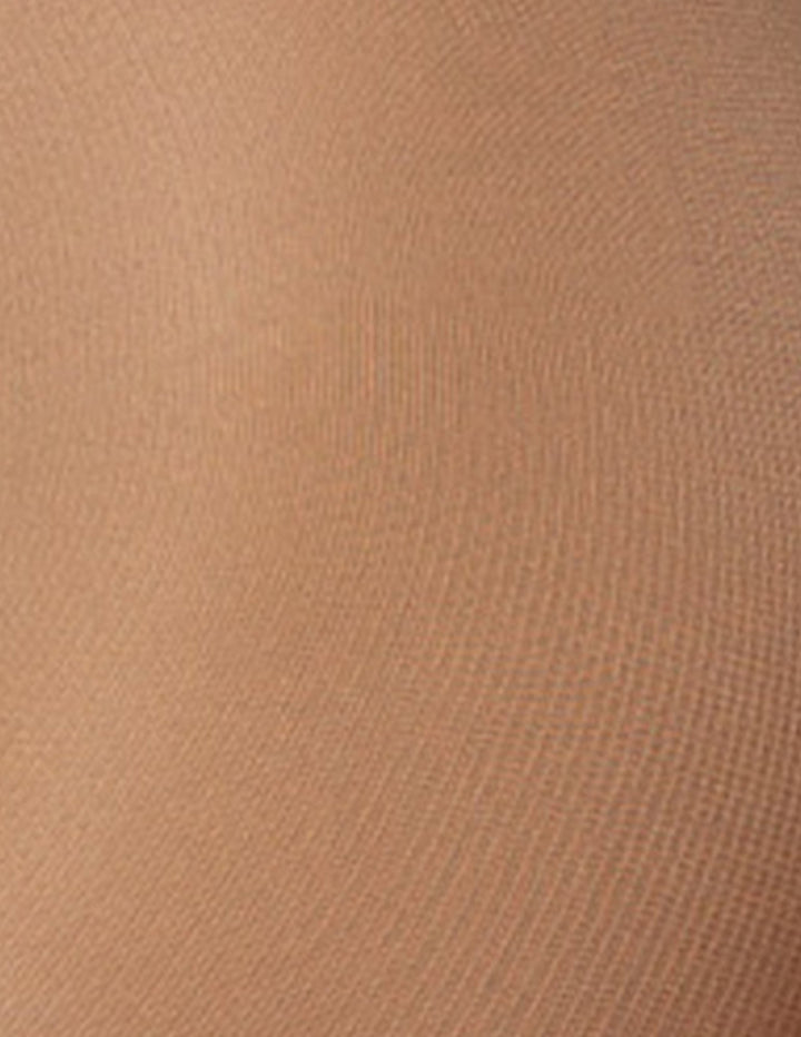 A close-up texture shot of a warm tan material with a fine ribbed pattern.
