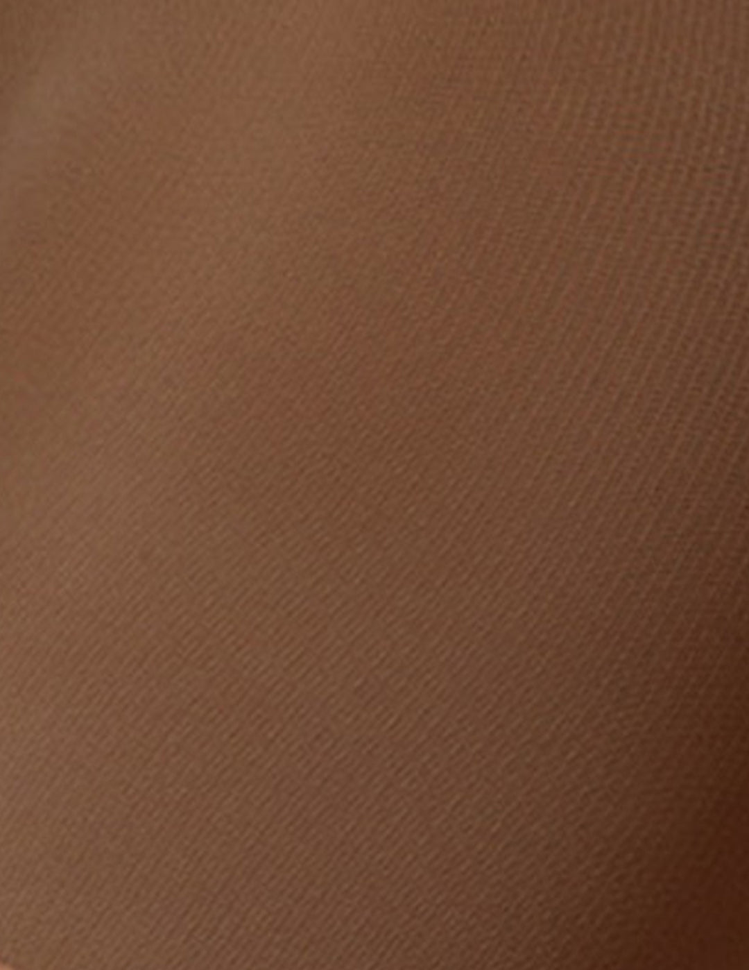 A close-up texture shot of a smooth, warm brown fabric.