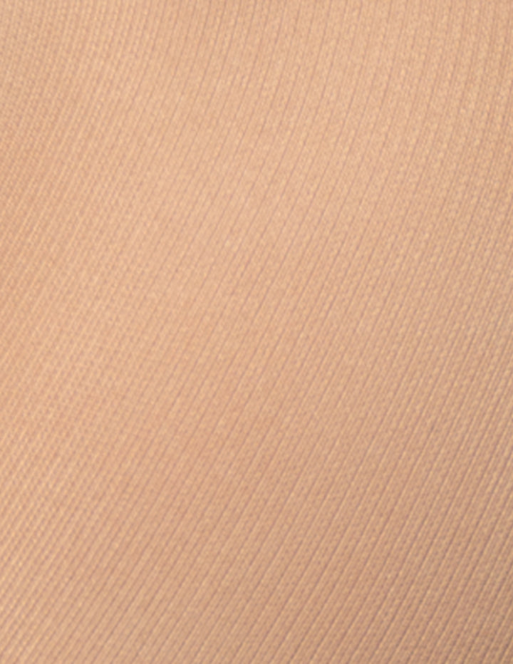 A close-up of a ribbed knit fabric in a warm nude-beige color, showing the texture and pattern detail.