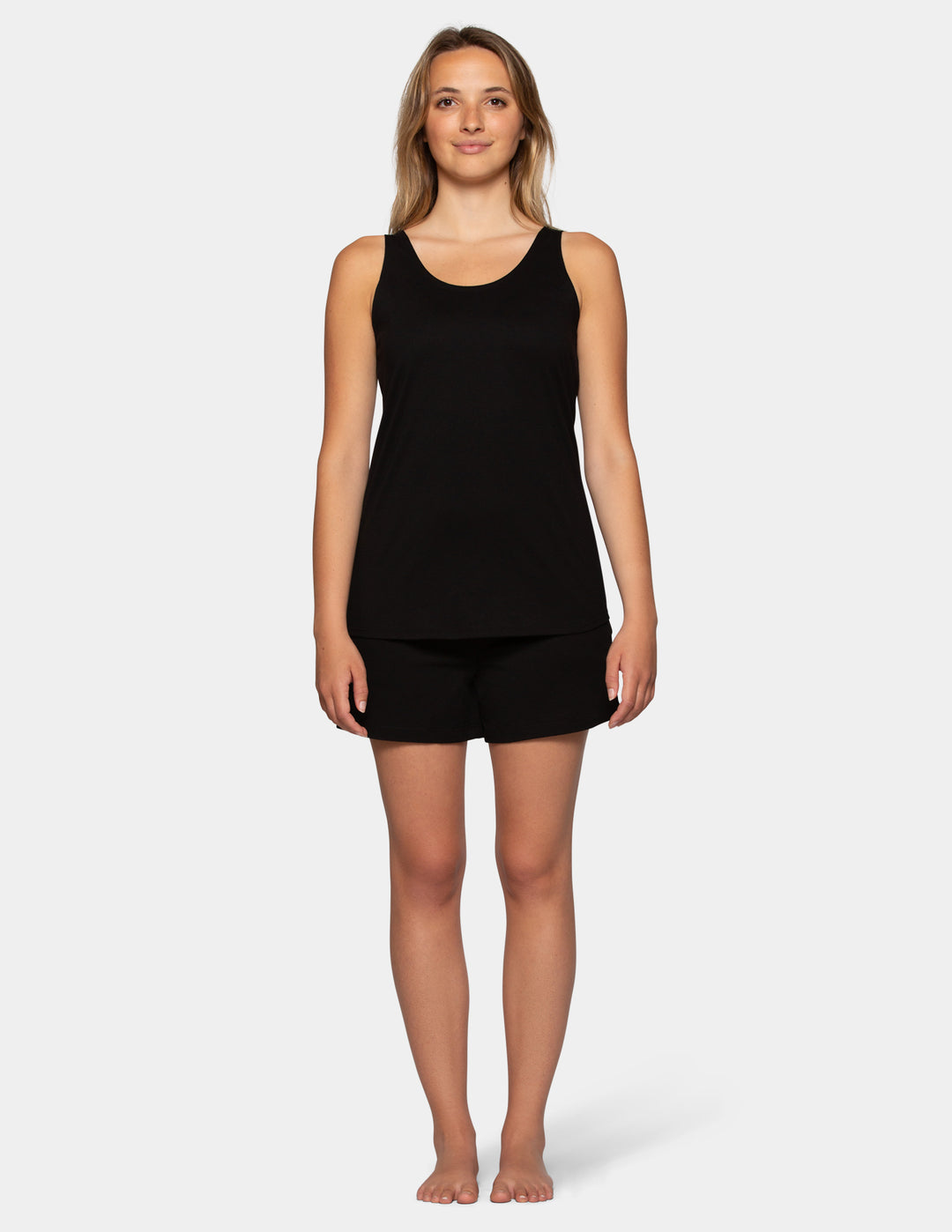 Woman in black pajama boxers and tank top set