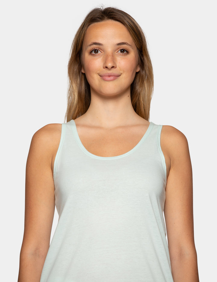 Woman wearing a pale blue pajama tank top