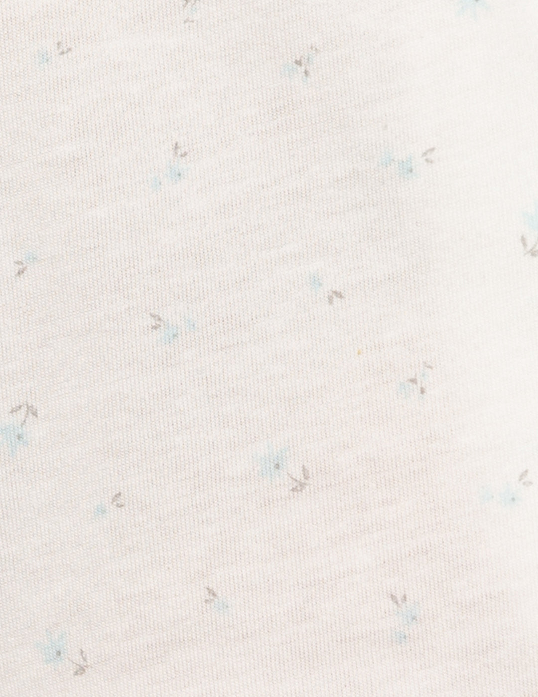White fabric with blue flower detail