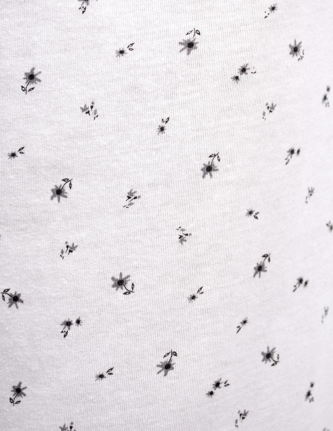 White fabric with grey flower design