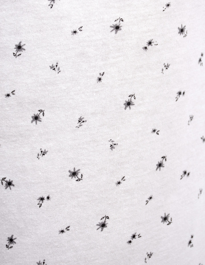 White fabric with grey flower design