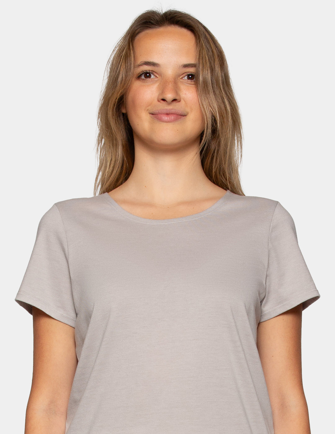 Woman wearing a grey pajama short sleeve tee