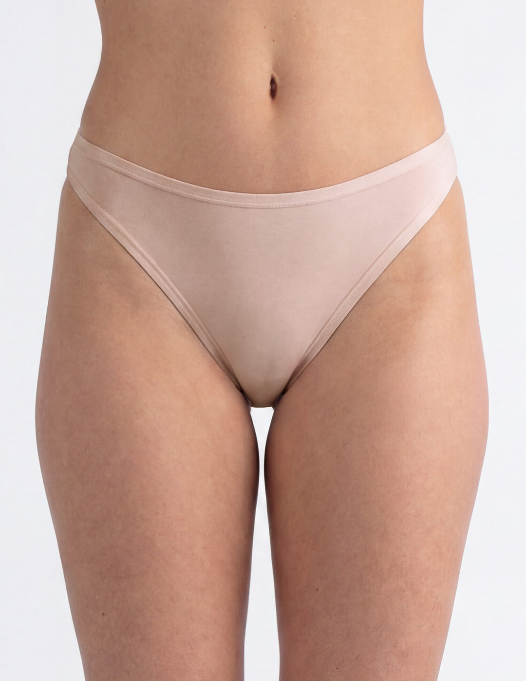 Woman wearing light pink thong underwear