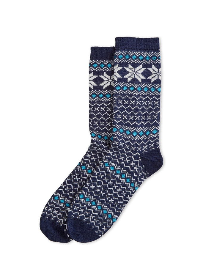 Pair of navy blue socks with a pattern on a white background