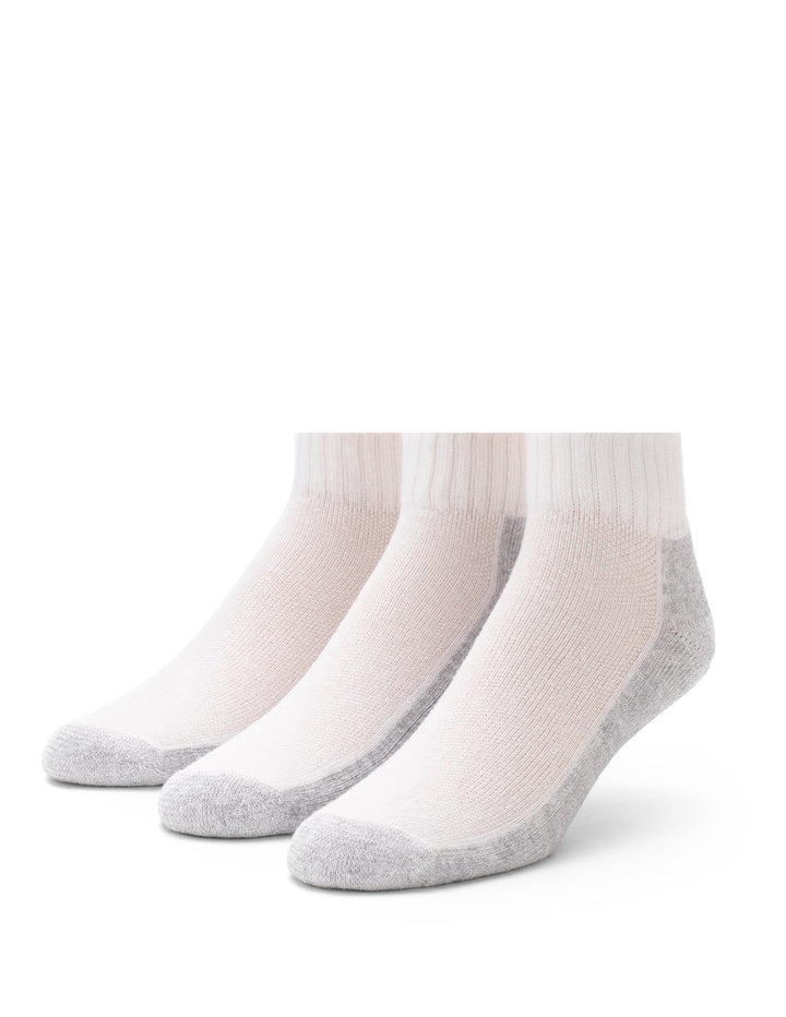 Three pairs of white socks with gray accents on a white background
