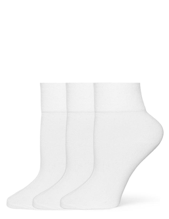 Three pairs of white socks on a white background