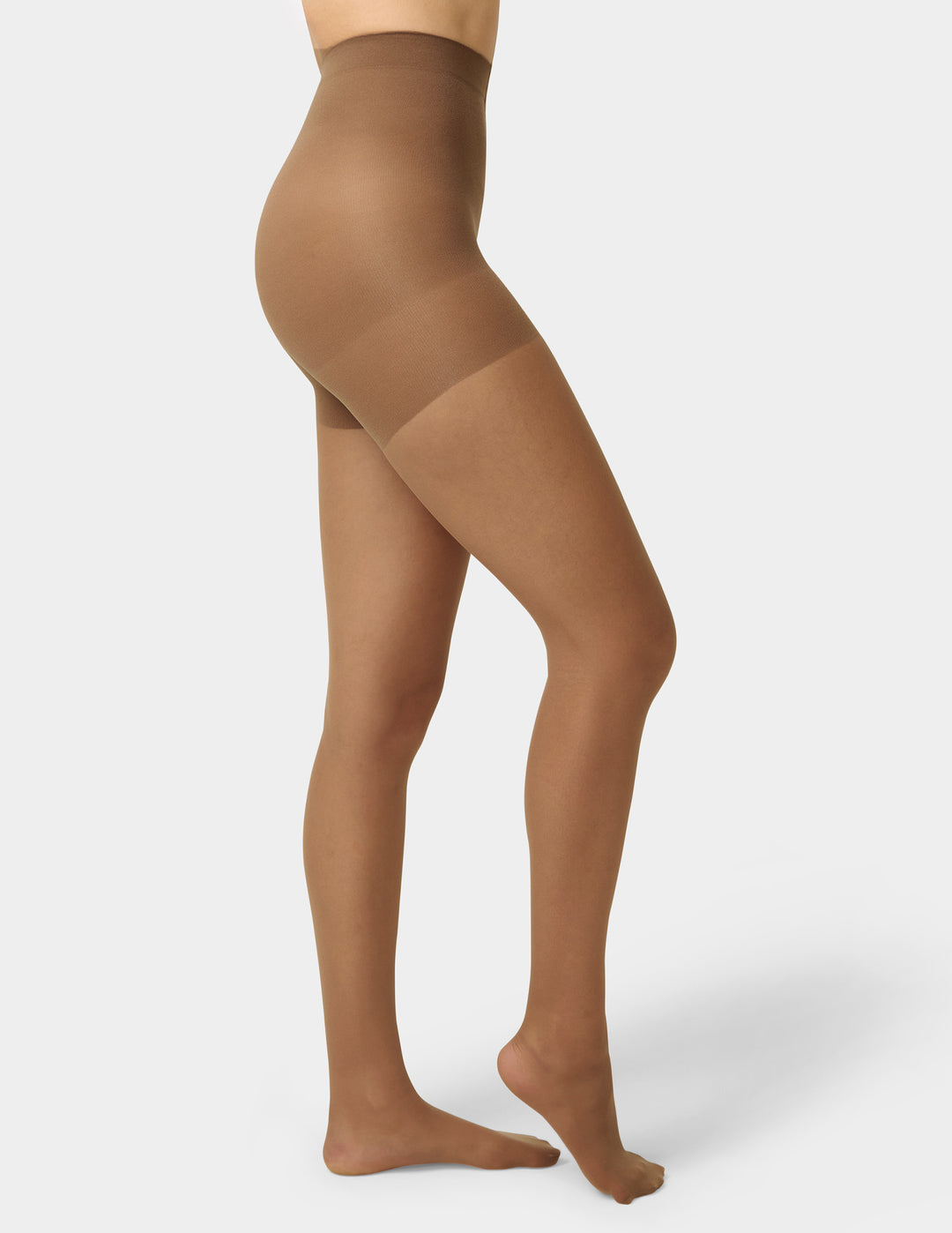 Brown tights worn by a model on a white background