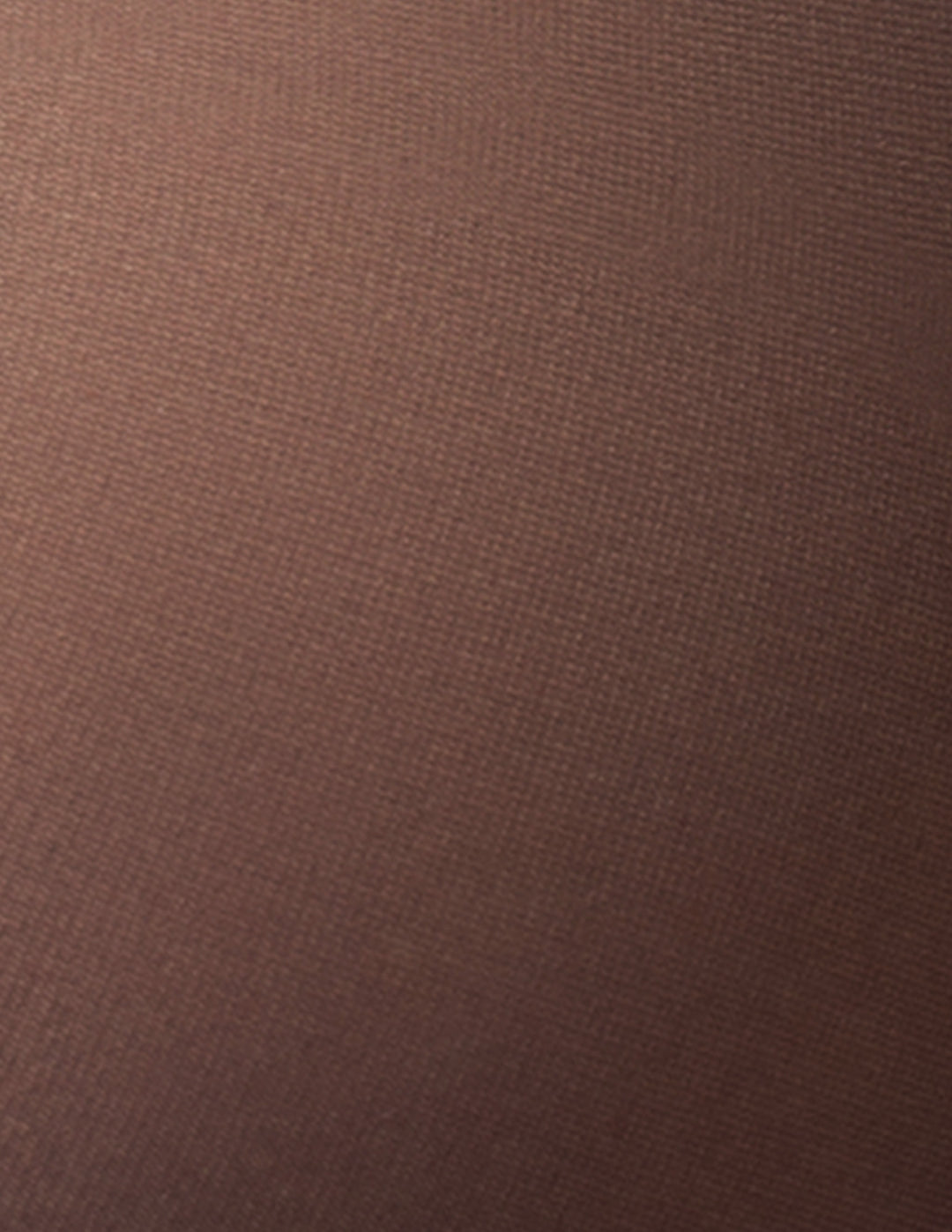 A close-up of a textured brown fabric surface with a fine woven pattern.