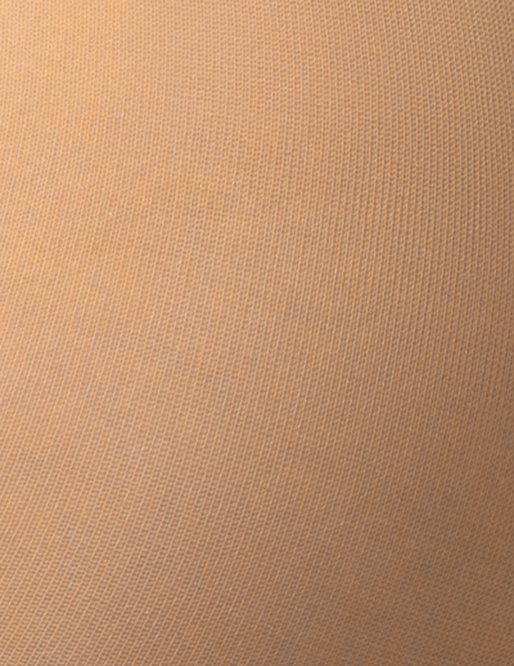 A close-up of a fine-knit fabric texture in a warm tan or camel shade.