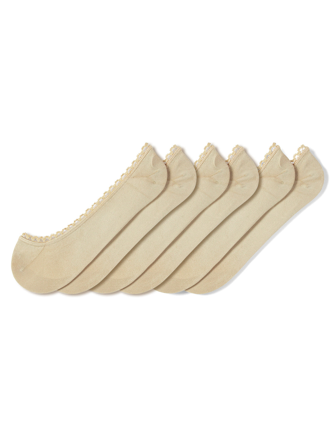 Set of five beige liner socks on a white background