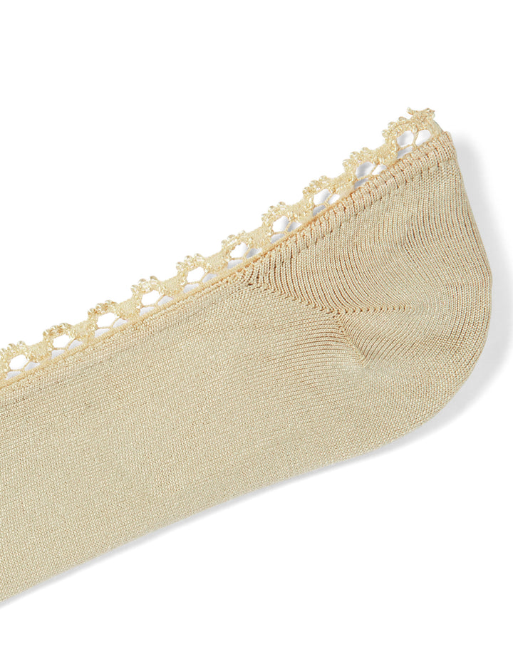 Beige sock with lace trim on a white background