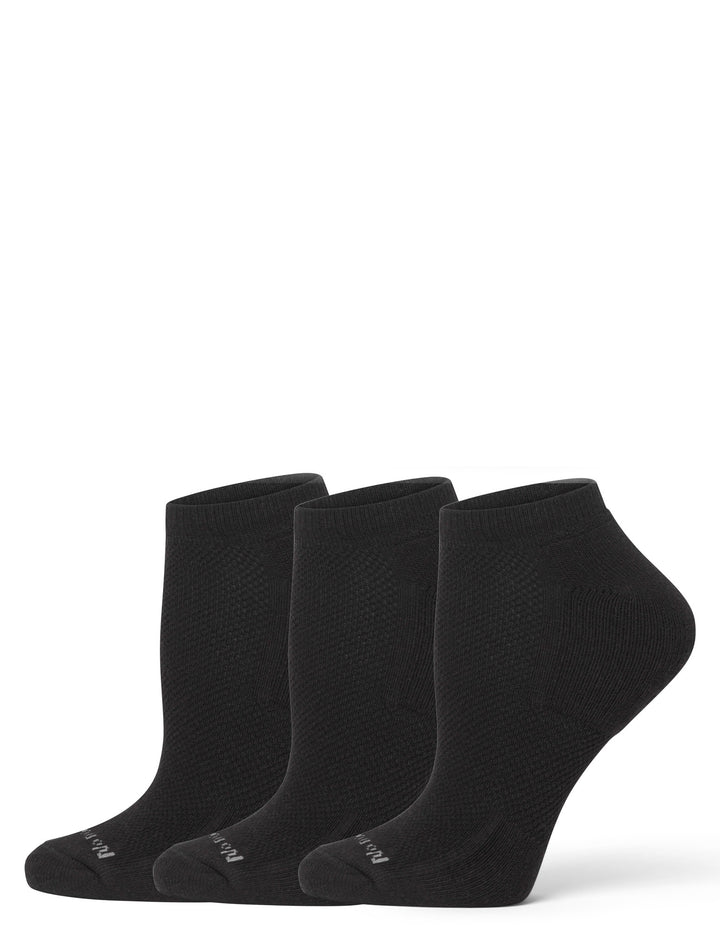 Three black ankle socks on a white background