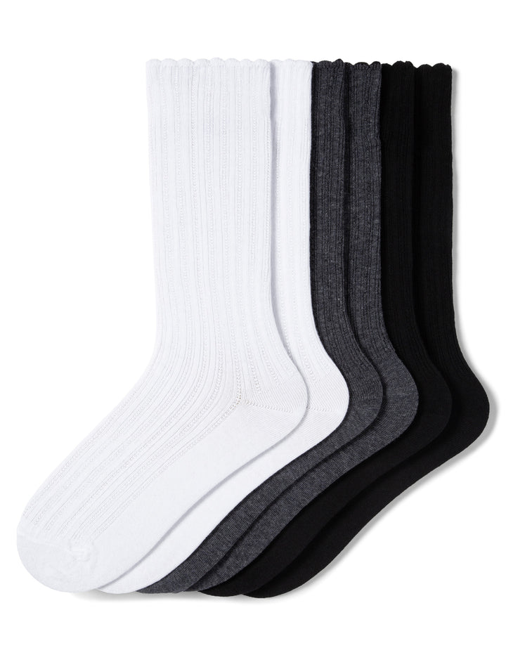 Set of white, gray, and black socks on a white background