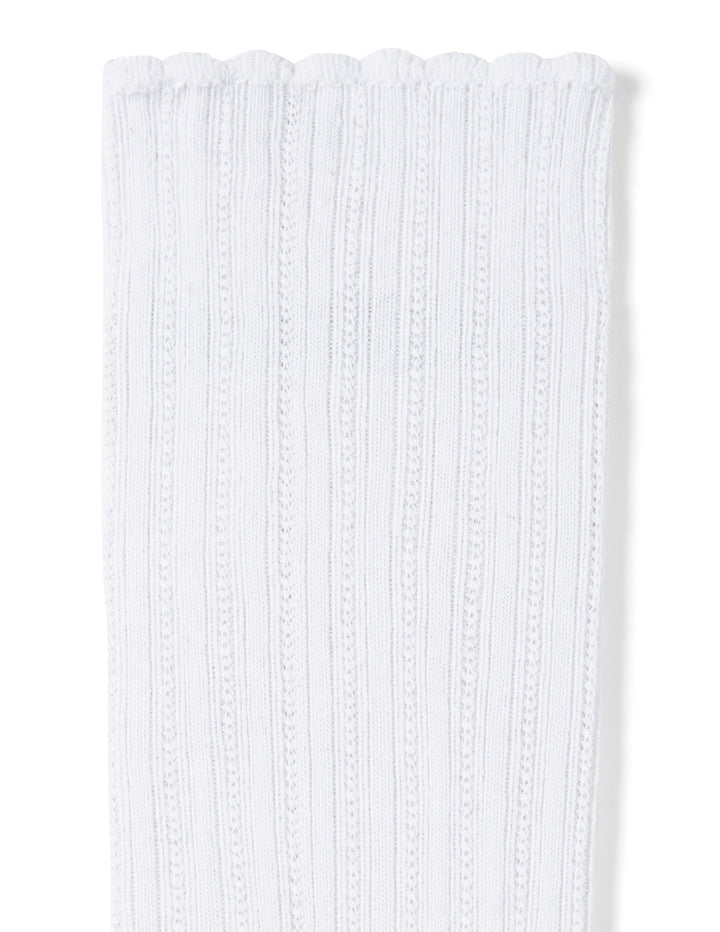 White ribbed knitted fabric on a white background