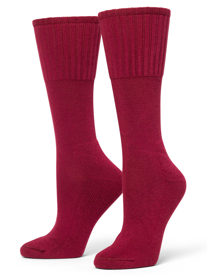Pair of red socks on a white background