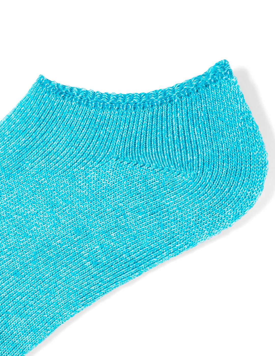 Close-up of a blue sock on a white background