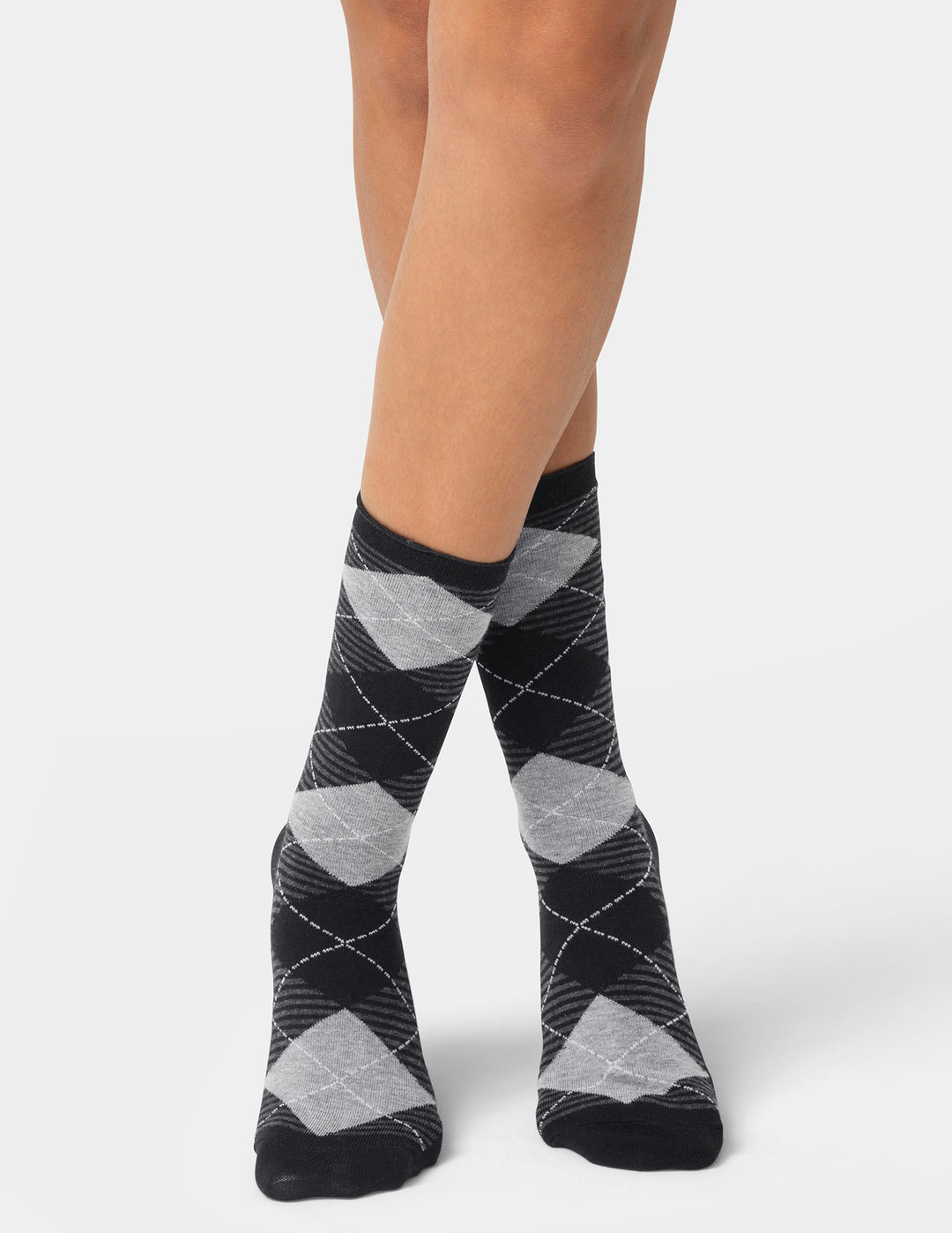 Black and gray argyle patterned socks on a white background