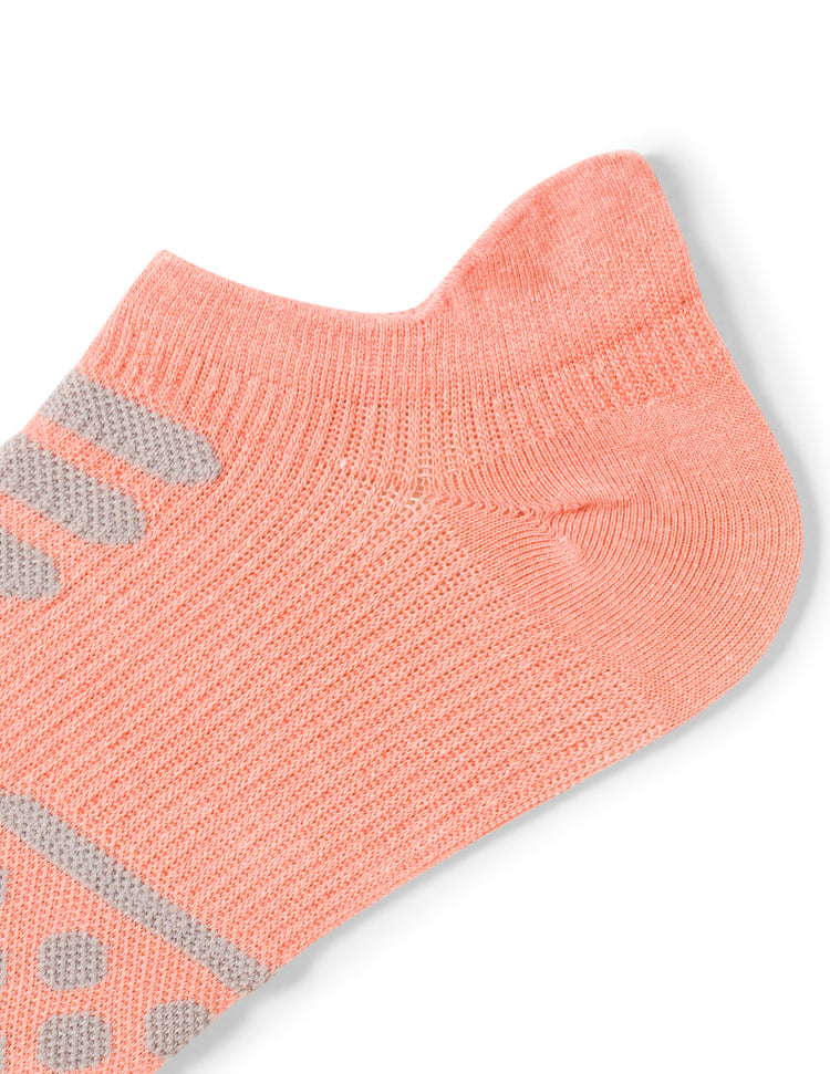 Coral ankle sock with gray accents on a white background