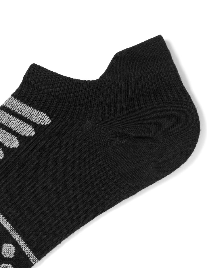 Black ankle sock with white stripes on a white background