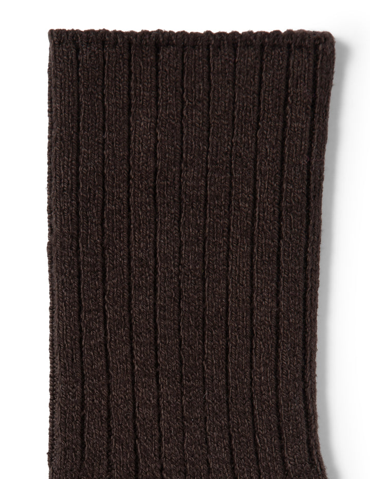 Brown ribbed sock on a white background